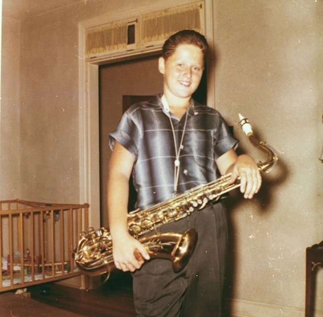 A young BIll Clinton with his saxophone.  Young Celebrity
