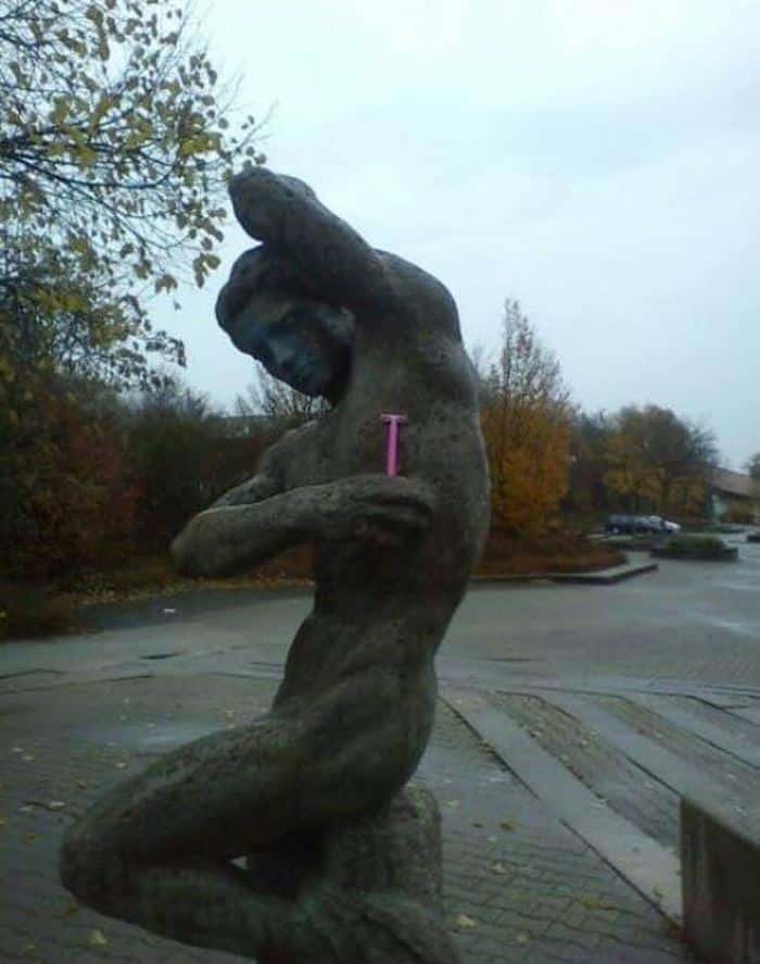 Cleaning under arm, why are staring Funny Sculpture