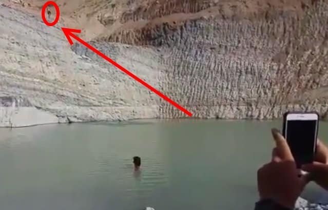 Cliff jump interrupted with earthquake and falling rocks