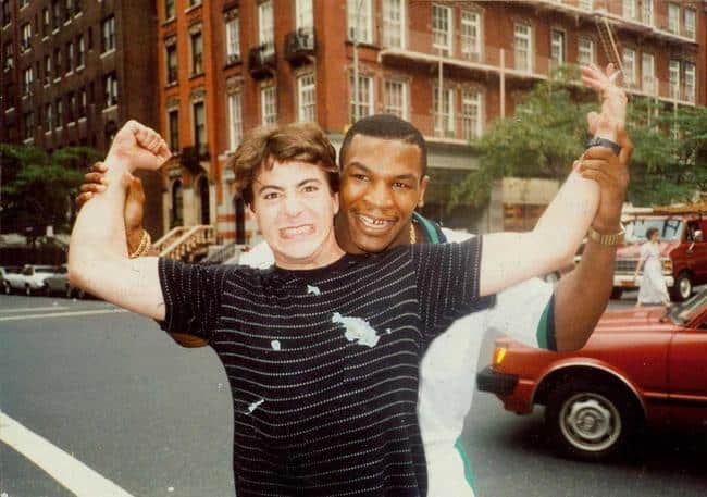 Robert Downy Jr poses with his father's friend, Mike Tyson.  Young Celebrity