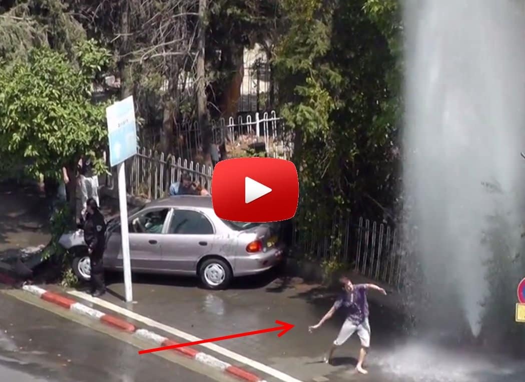 This guy improvised a beautiful street dance under a broken fire hydrant