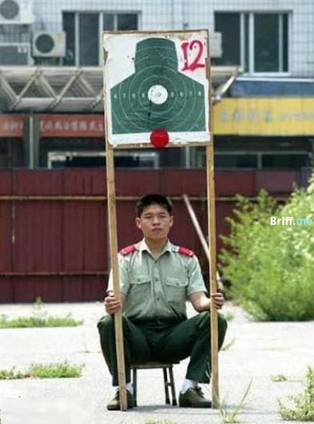 Work Pressure - Holding Shooting Target
